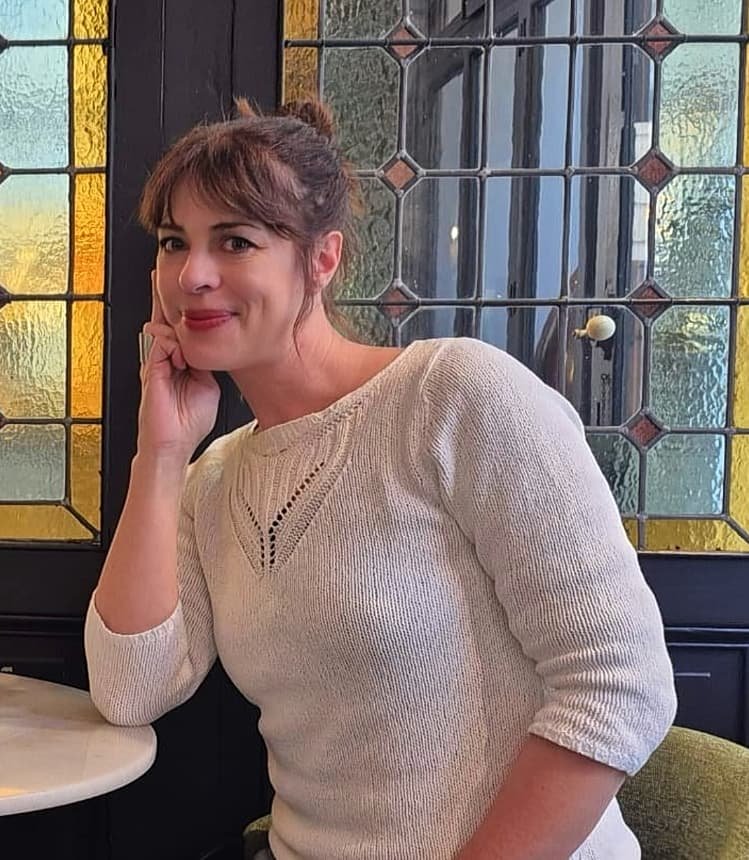 Online French teacher Alice, portrait in a French café